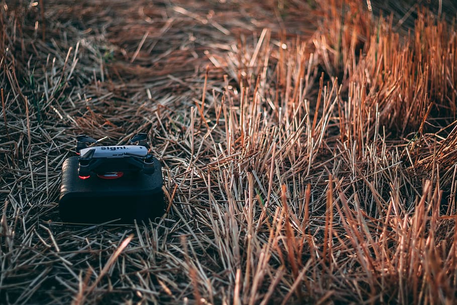 black electronic device on grass, reydon, united kingdom, countryside HD wallpaper