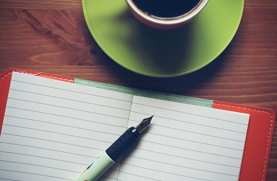 Fountain Pen on Top of Notebook Beside Drinking Mug, beverage HD wallpaper