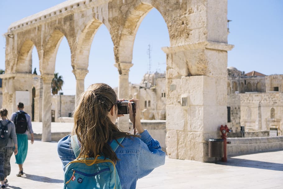 Woman Taking Pictures of Ruins, ancient, arch, architecture, backpack