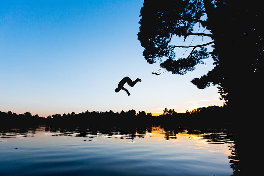 dawn, dusk, jumping, lake, outdoors, person, river, silhouette HD wallpaper