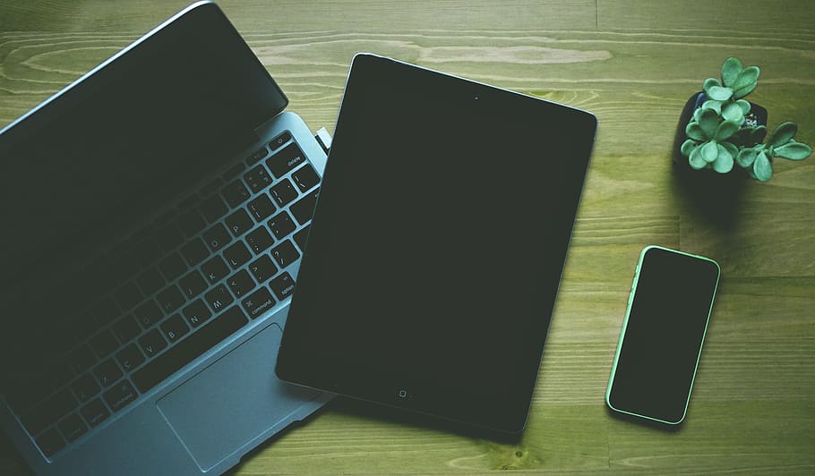 Black Ipad Beside Green Iphone 5c, apple, desk, electronics, gadgets