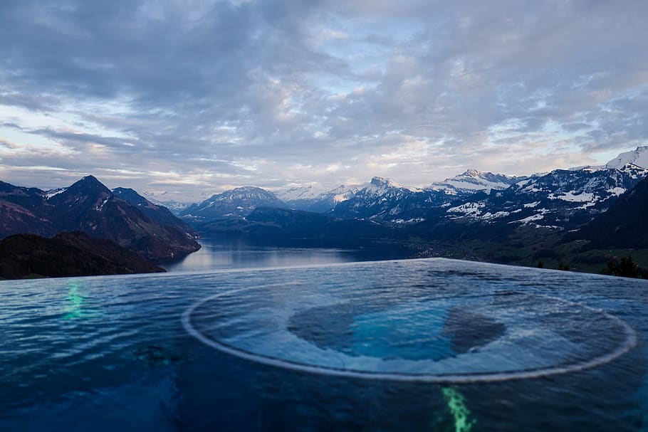 River Surrounded by Mountains Under White Clouds, daylight, ice HD wallpaper