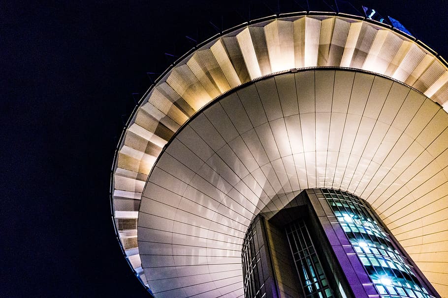 round beige building with lights, city, night, tower, arch, arched HD wallpaper