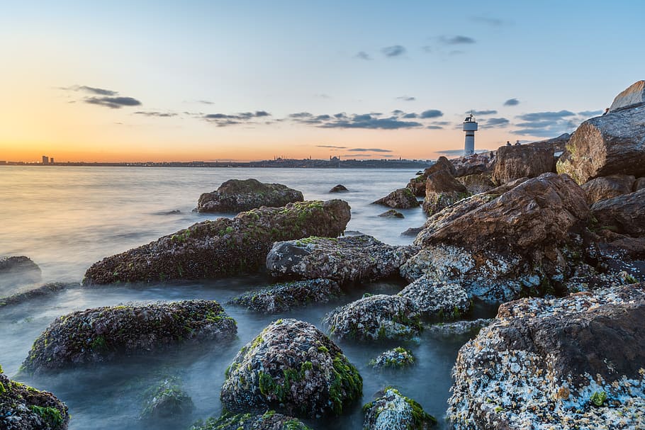 Photo of Rocky Shore During Dawn, 4k wallpaper, beach, boulders