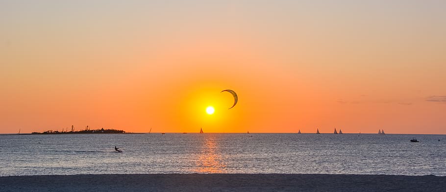 orange sun during golden hour, water, sky, sunset, sea, beauty in nature HD wallpaper