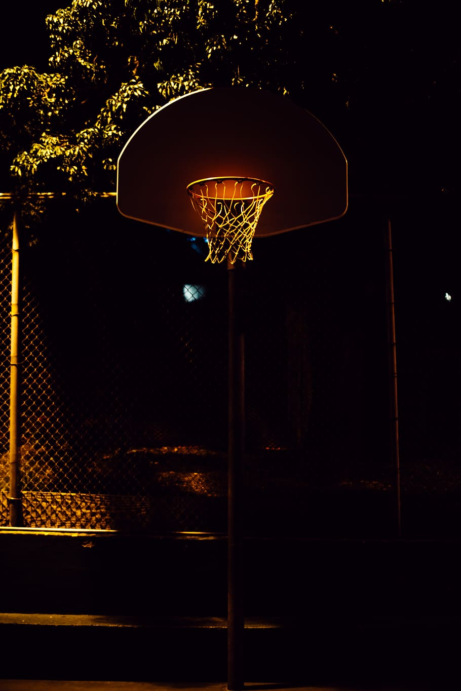 brown and white basketball hoop with net, lamp, hypebeast, basketball court
