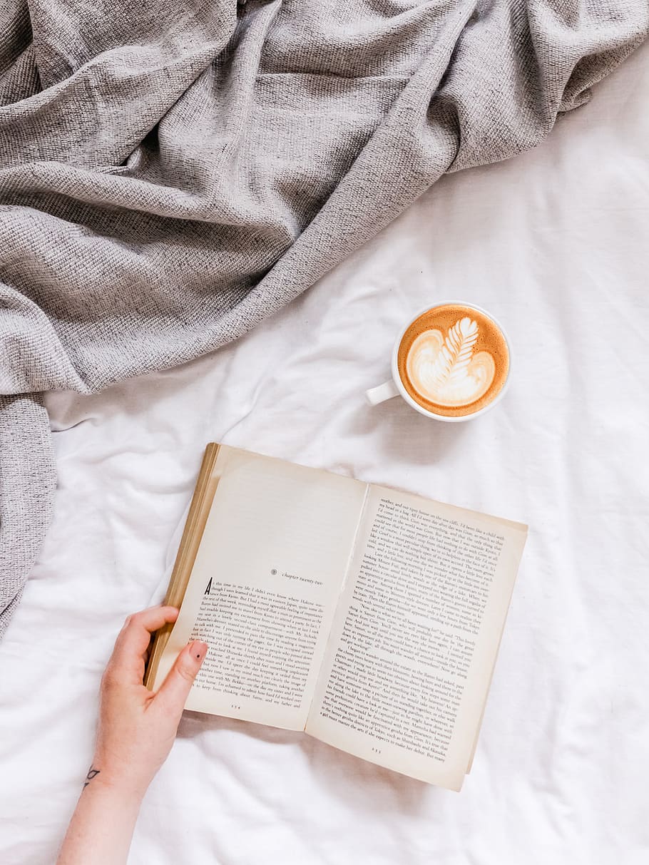 creamy coffee in white ceramic teacup, book, text, diary, clothing