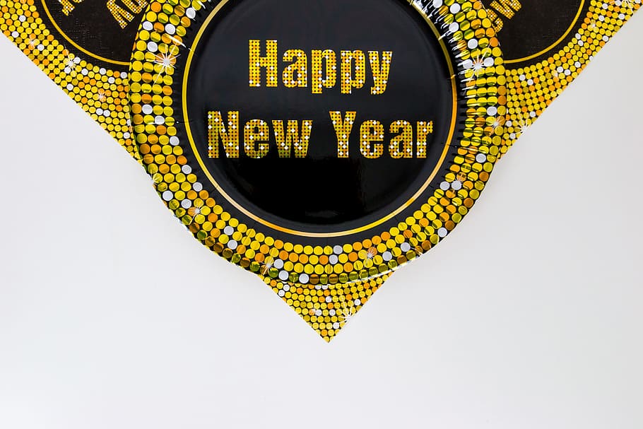 Happy New Year Concept with paper plate, text, indoors, studio shot HD wallpaper