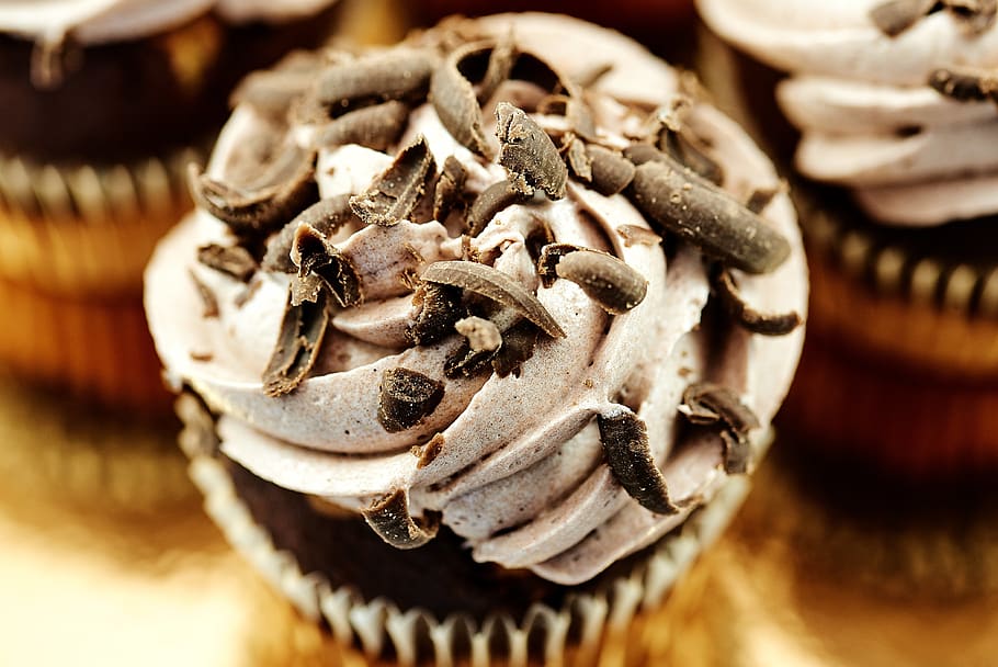 Cupcakes With Chocolate Shavings on Top, baked, close-up, cream
