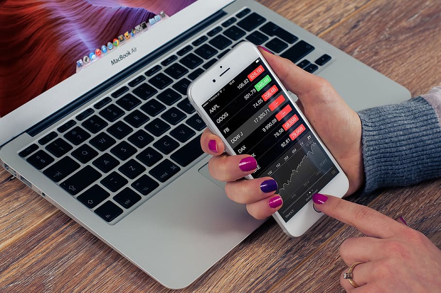 person holding silver iPhone 6, computer, hand, woman, laptop HD wallpaper