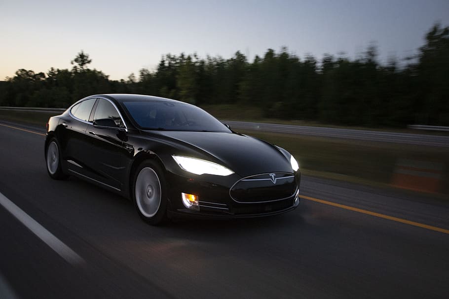 time-lapse photography of black sedan on road, musk, electic car HD wallpaper