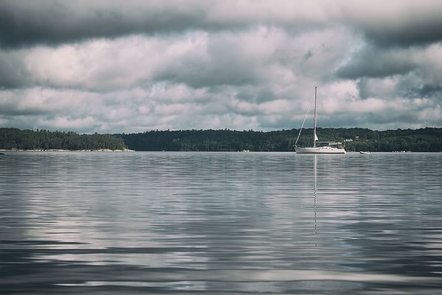 sea, ocean, water, waves, nature, dark, clouds, sky, boat, sailing HD wallpaper