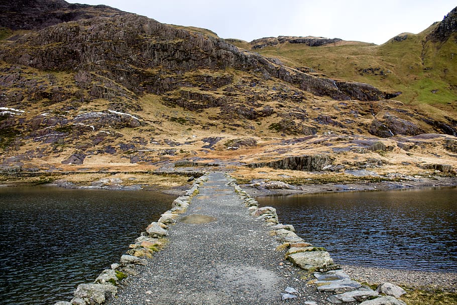 grey pathway beside mountain during daytime, nature, road, outdoors HD wallpaper
