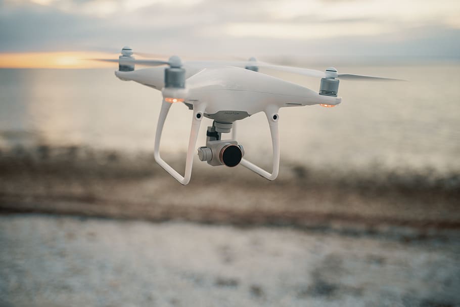 Flying White Quadcopter Drone, camera, technology, transportation HD wallpaper