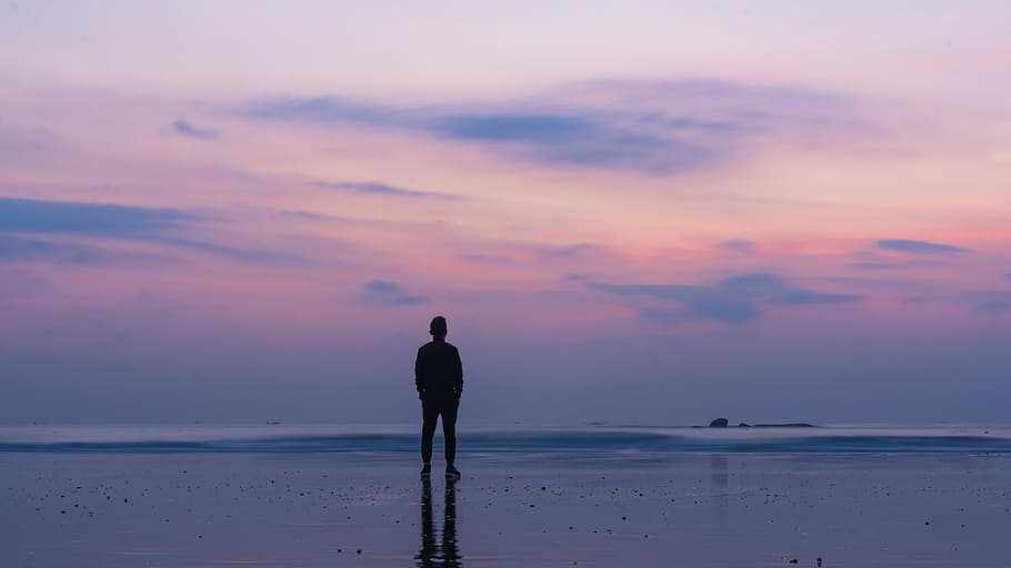 silhouette of man standing on seashore, china, beach, xiamen