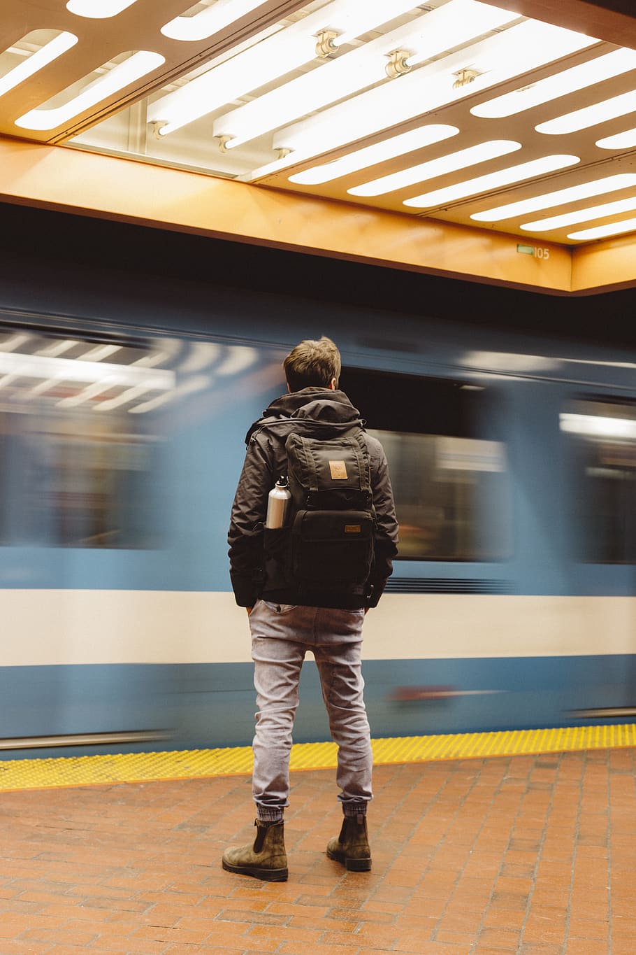 man on a train station, public transportation, motion, rail transportation HD wallpaper