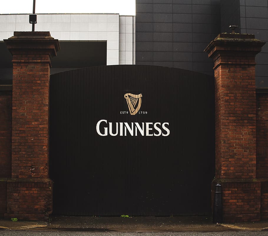 black Guinness gate, communication, text, western script, architecture