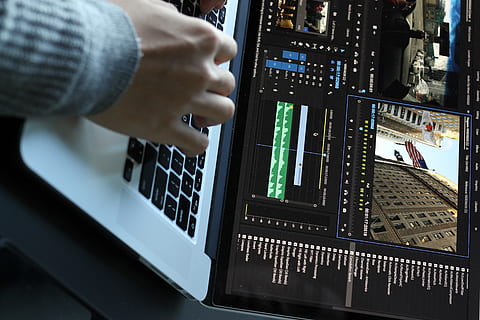 person using MacBook pro turned on, keyboard, human, people, electronics HD wallpaper