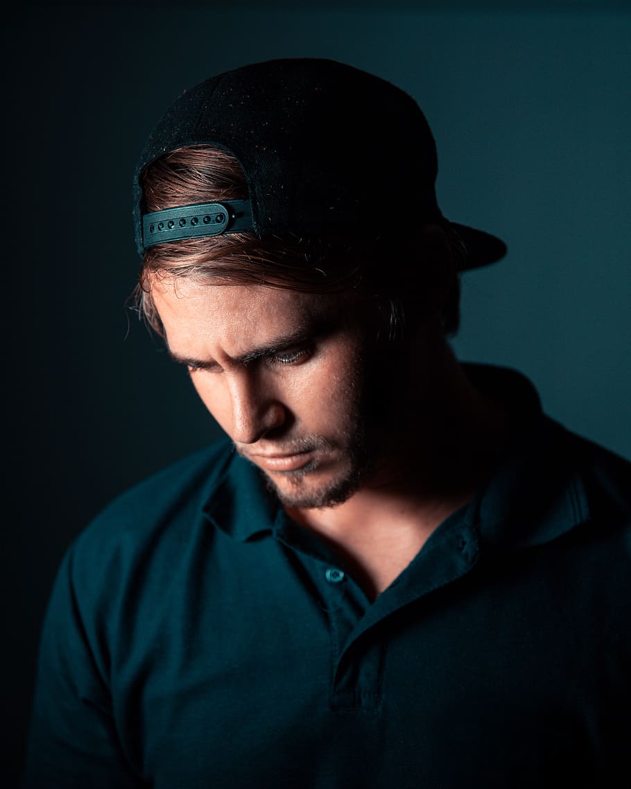 Man Wearing Cap, facial expression, looking down, photoshoot HD wallpaper