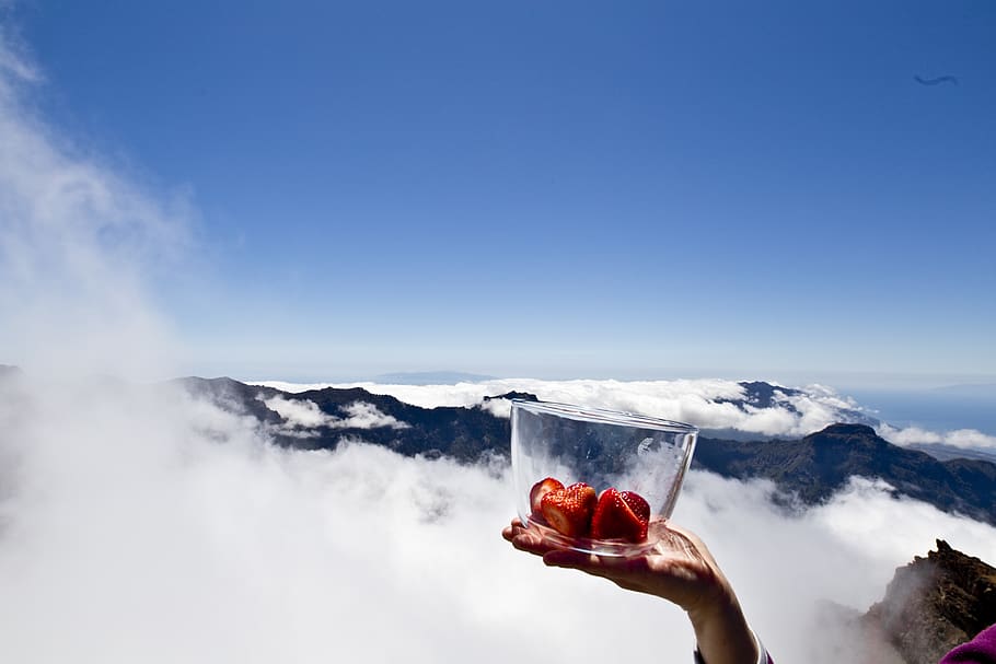 mountains, vulcan, strawberry, human hand, sky, human body part HD wallpaper