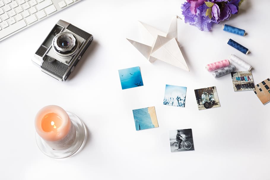 Styled photo with camera and candle, background, blog, business