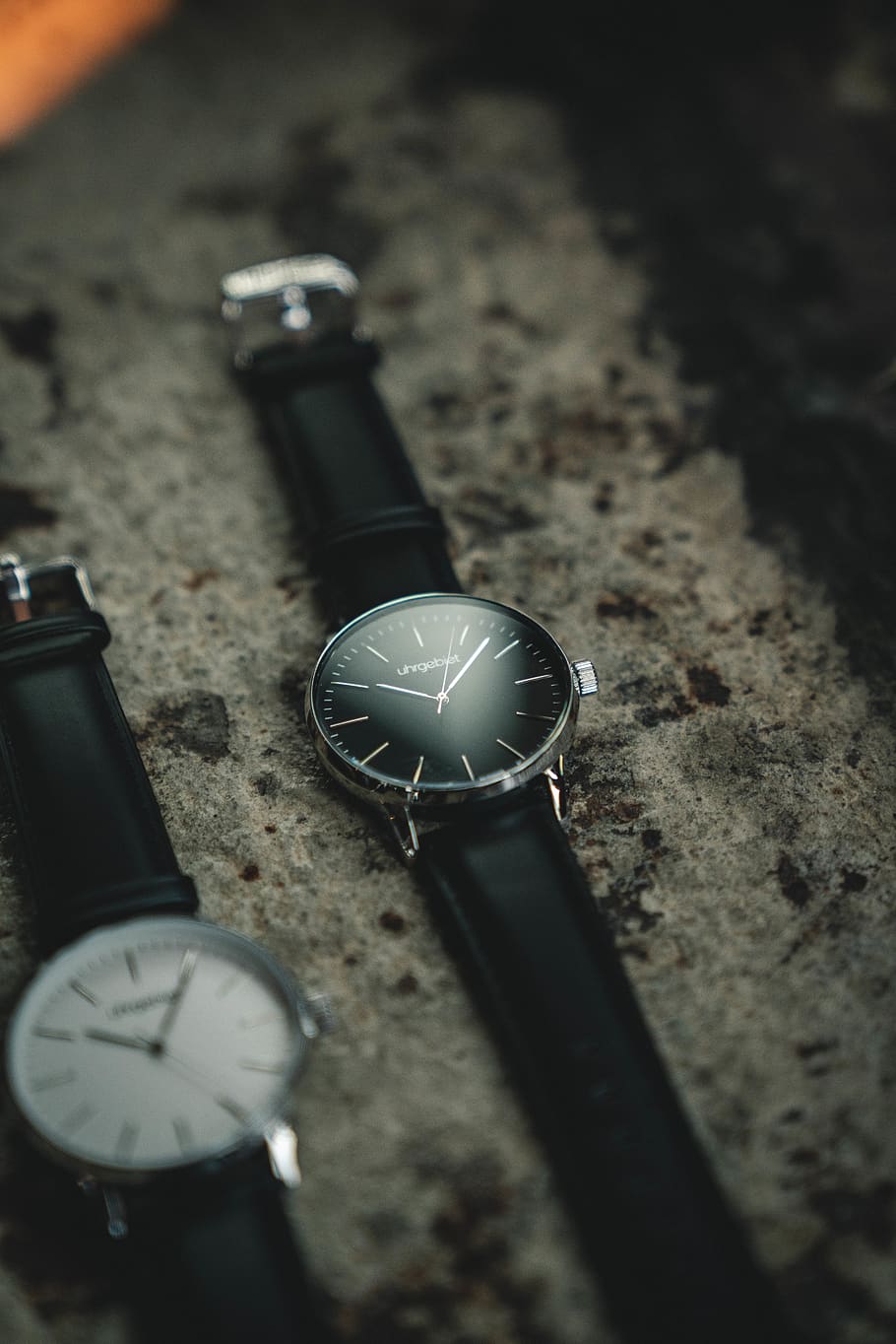 Photo of Two Analog Watches with Black Leather Bands on Gray Surface, HD wallpaper