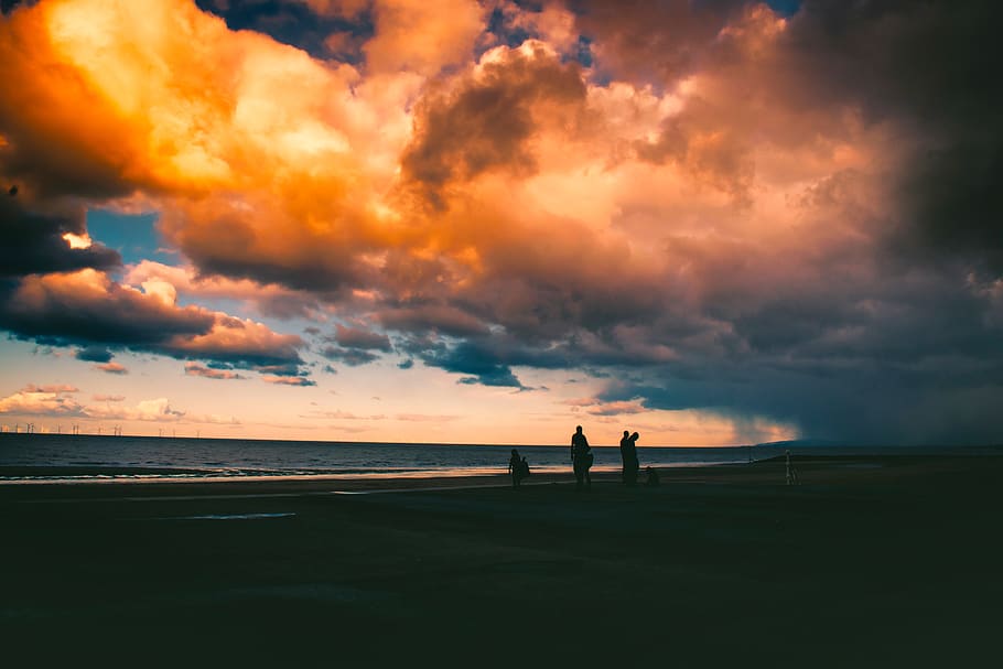 Silhouette Of People On Shore Under Cloudy Sky, beach, clouds HD wallpaper