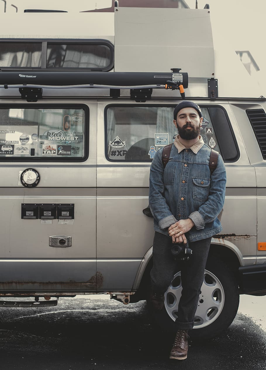man leaning on silver SUV, human, person, apparel, clothing, pants HD wallpaper