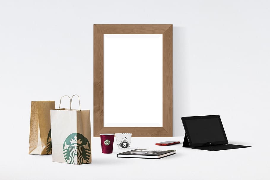 poster, frame, laptop, book, smartphone, cup, paper bag, technology HD wallpaper