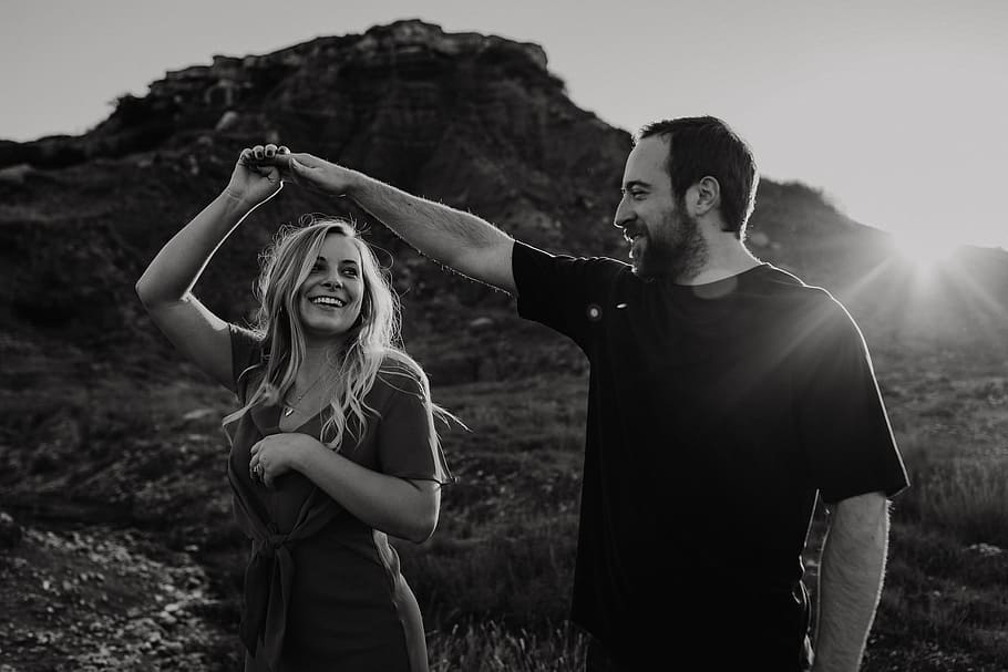 man holding woman's right hand, twirl, explore, adventure, mountain HD wallpaper