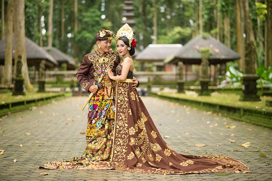 Photo of Man and Woman Wearing Brown Floral Dress, adult, beautiful
