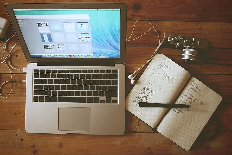 turned on MacBook Air beside white notebook, technology, computer HD wallpaper