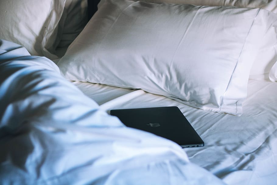 black MacBook on bed, furniture, communication, bedroom, indoors HD wallpaper