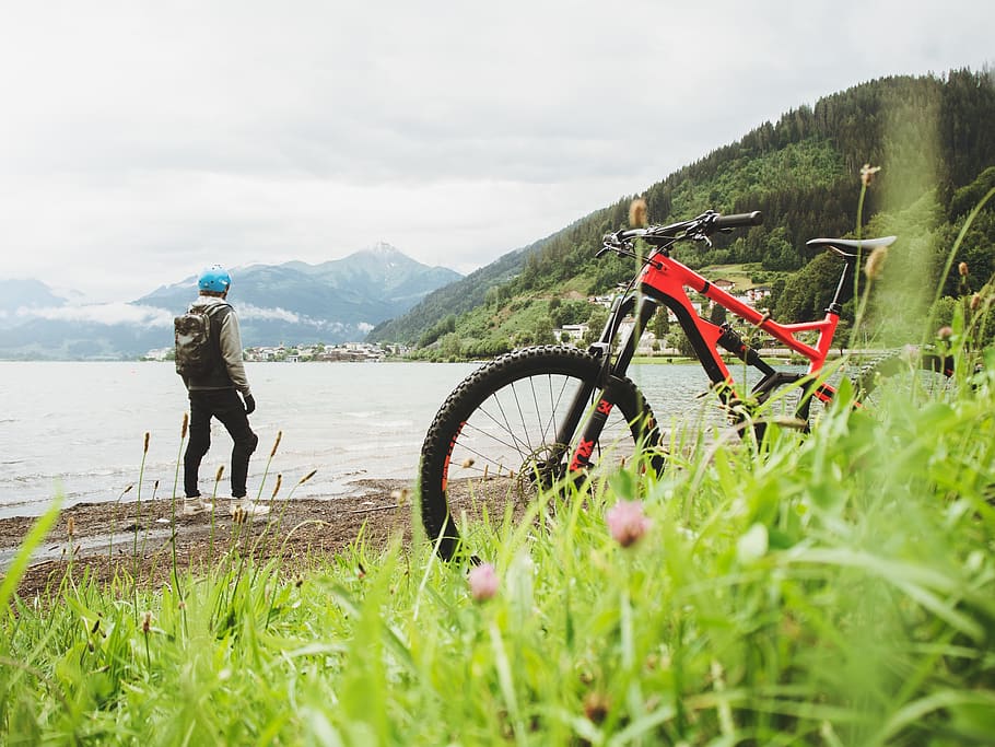 Man Standing Near Shore, active, adventure, bicycle, biker, biking HD wallpaper
