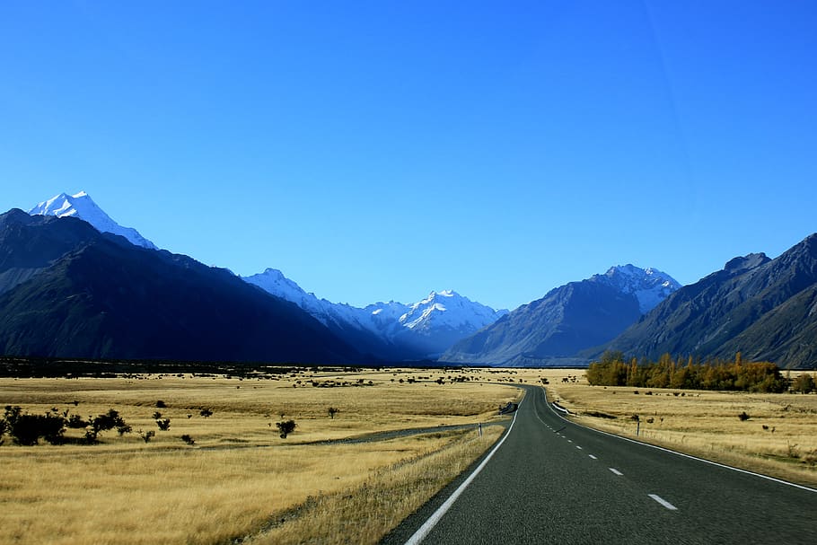Empty Road Near Mountain Under Blue Skies, asphalt, clouds, daylight HD wallpaper