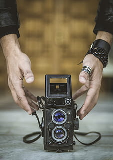 vintage black camera, human, person, electronics, finger, wood HD wallpaper