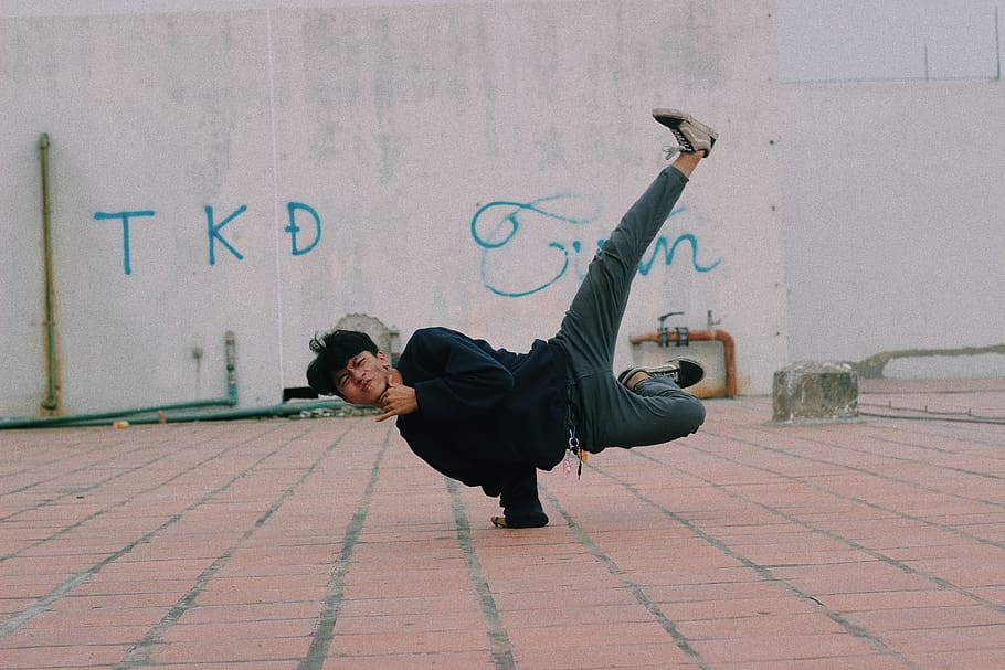 man doing 1 hand stand, human, person, clothing, apparel, pants HD wallpaper