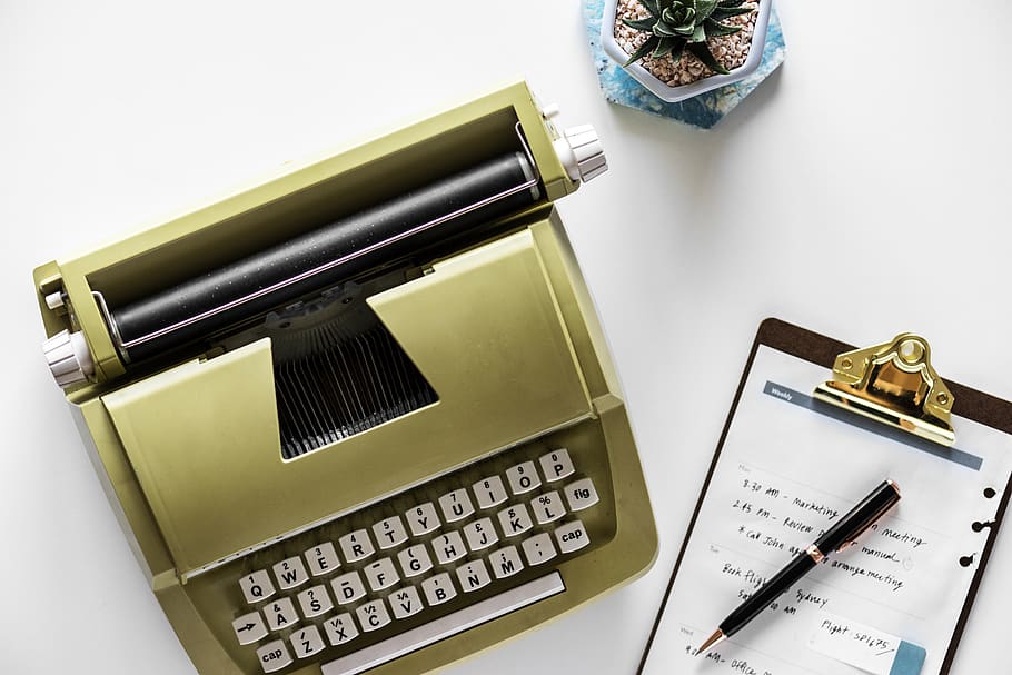 Gold Type Writer Beside Clip Board and Click Pen, flatlay, typewriter HD wallpaper