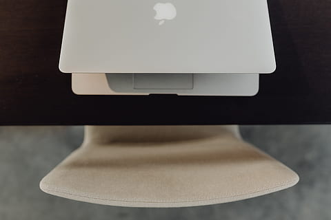 Stylish workspace with MacBook computer on home or studio, tech HD wallpaper