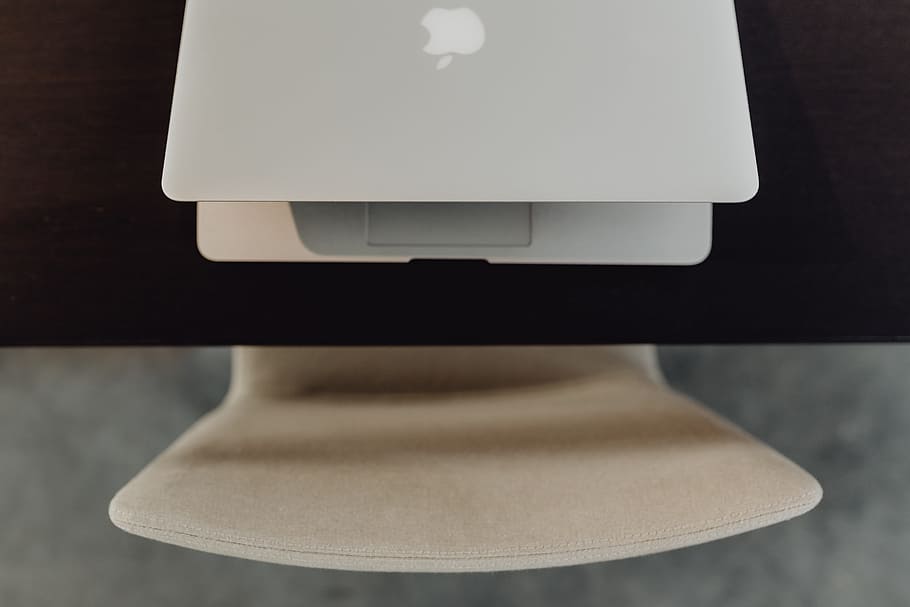 Stylish workspace with MacBook computer on home or studio, tech HD wallpaper