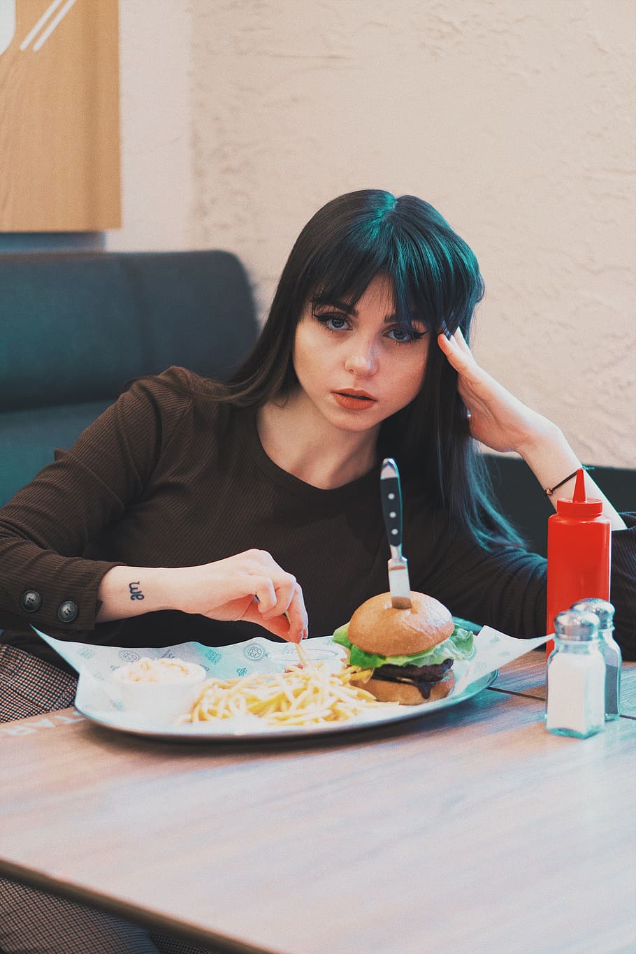 woman sitting in front of tray of food, burger, person, human, HD wallpaper