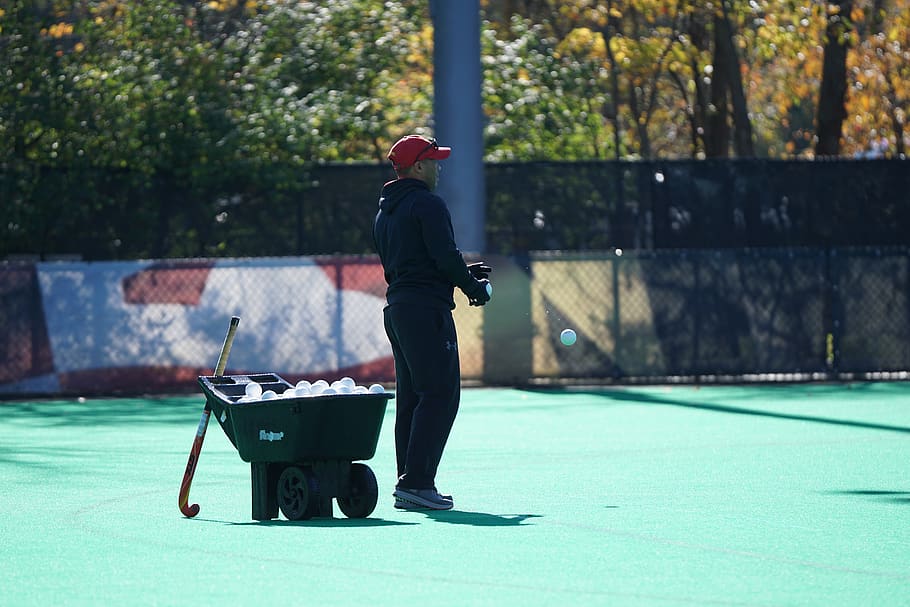 man standing beside wheelbarrow, human, person, field hockey and lacrosse complex HD wallpaper