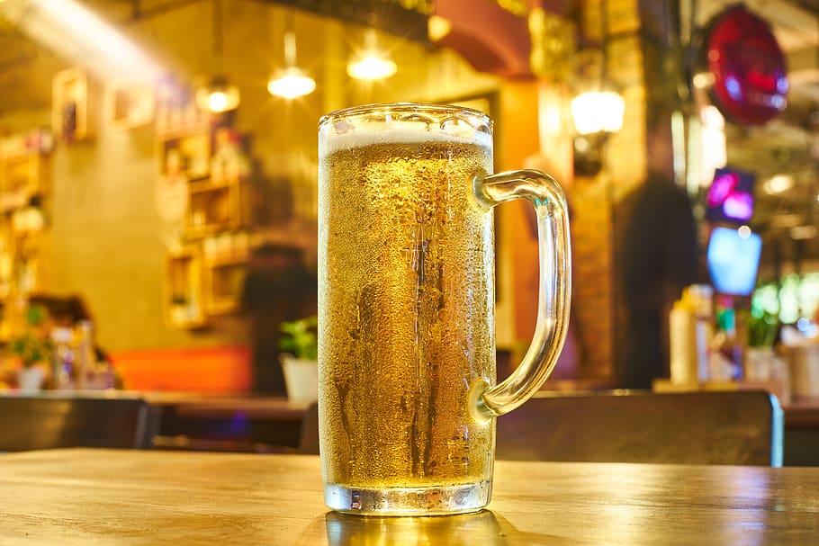 Full Clear Glass Beer Mug on Brown Wooden Counter, alcohol, background