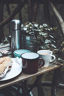 mugs beside plate with bread on table, pottery, saucer, coffee cup HD wallpaper