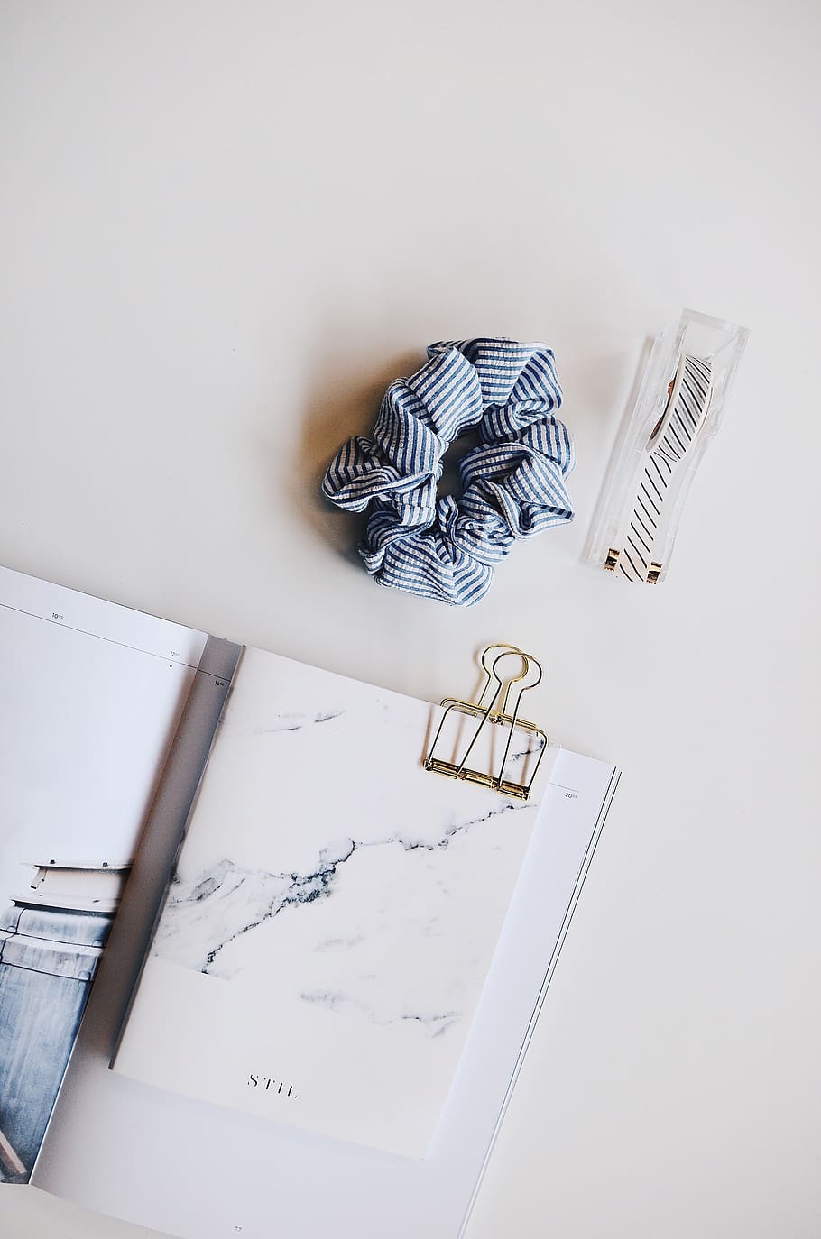 A clipboard on a white surface., paper, indoors, high angle view HD wallpaper