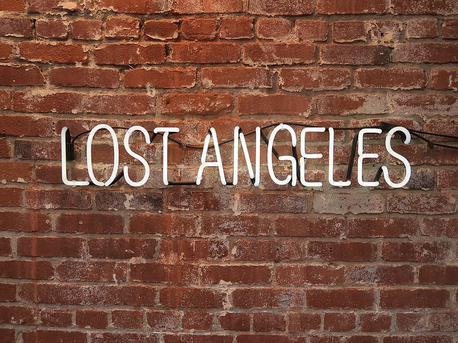 lost Angeles text on wall, neon, light, sign, brick, open brick