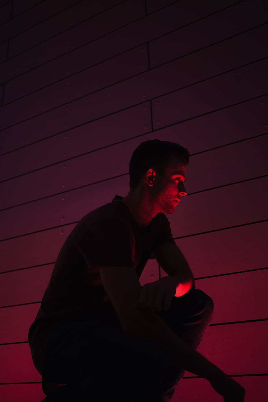 man wearing shirt and jeans, red wall, red light, portrait, one person HD wallpaper