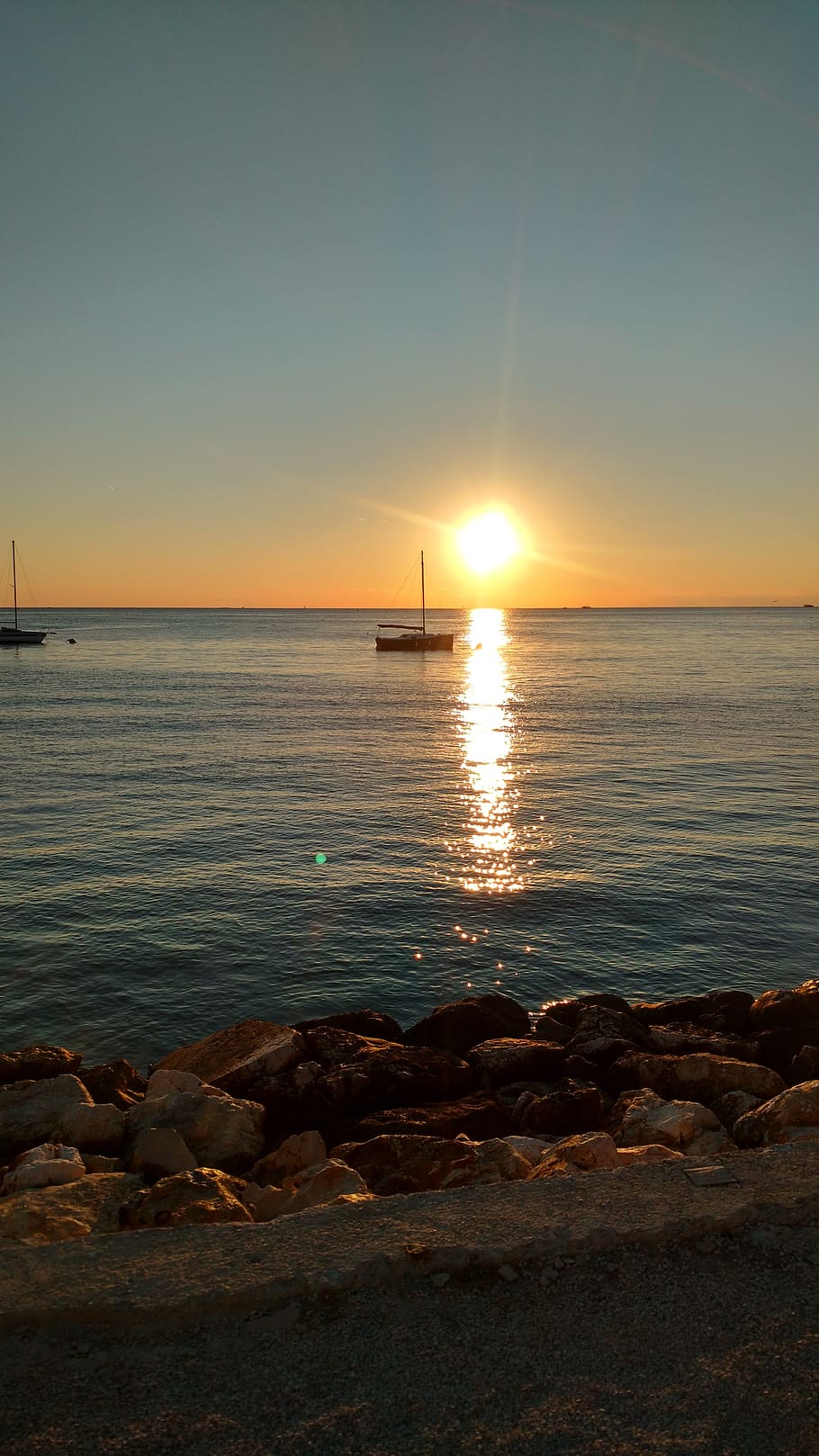 sunset, sea, beach, summer, coast, stones, dusk, nature, water HD wallpaper