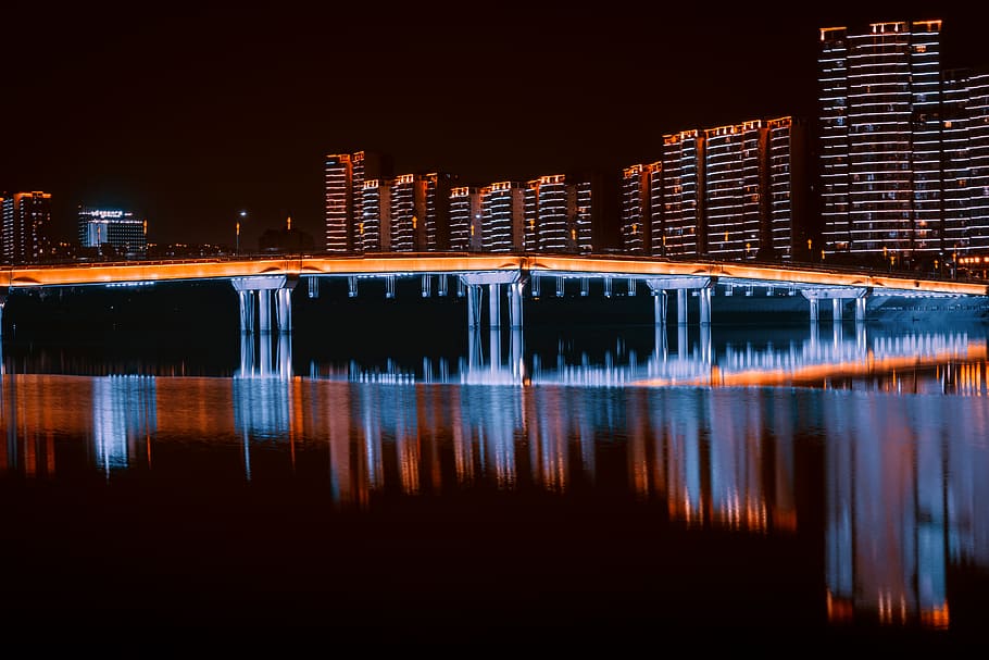brown concrete building, water, waterfront, nature, lighting HD wallpaper