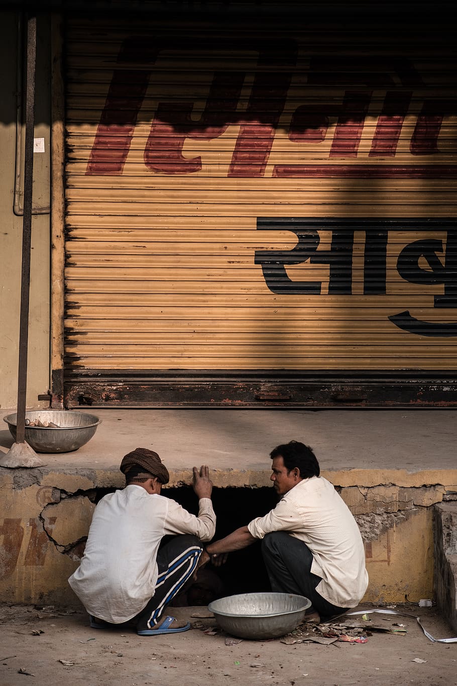 Two Man Sitting Near A Hole, adults, broken, calamity, construction HD wallpaper